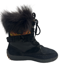 Stivali in pelliccia Tecnica