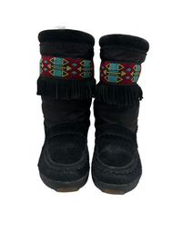 Stivale in pelliccia Tecnica